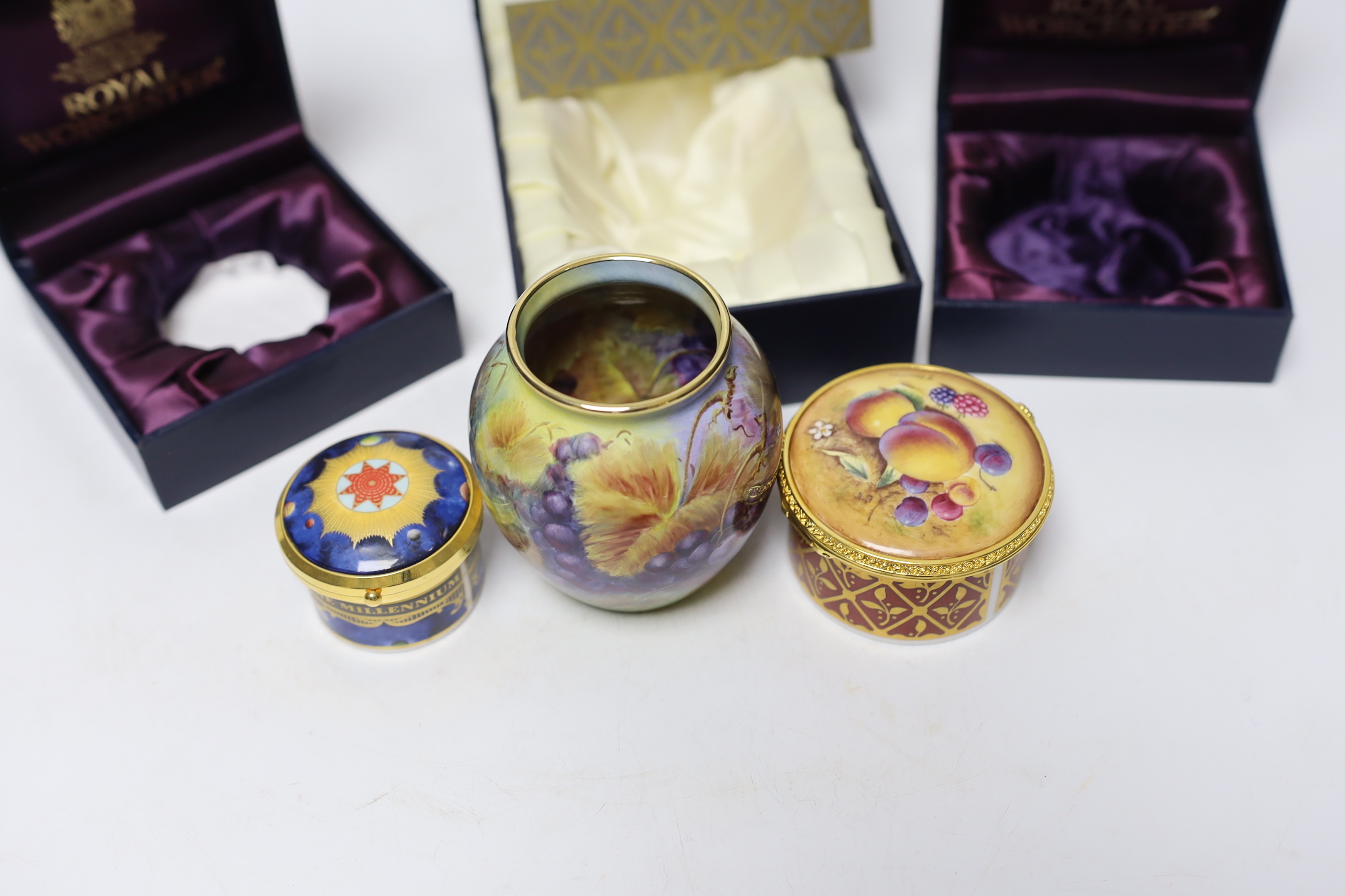 A modern boxed limited edition Moorcroft enamel vase, together with two Royal Worcester boxed porcelain boxes (3)